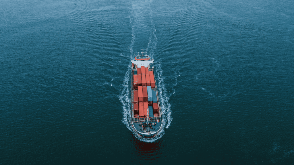 Container ship transporting goods across open sea